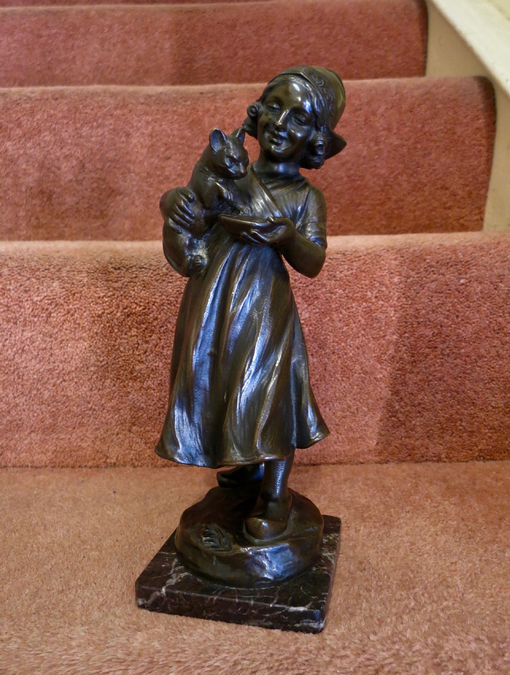  GIRL FEEDING A KITTEN: BRONZE FIGURE
