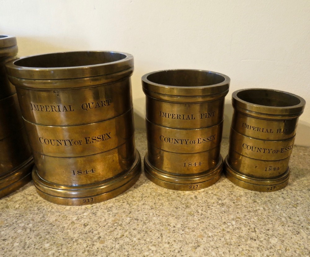 SET OF SEVEN BRONZE MEASURES DATED 1844 View V