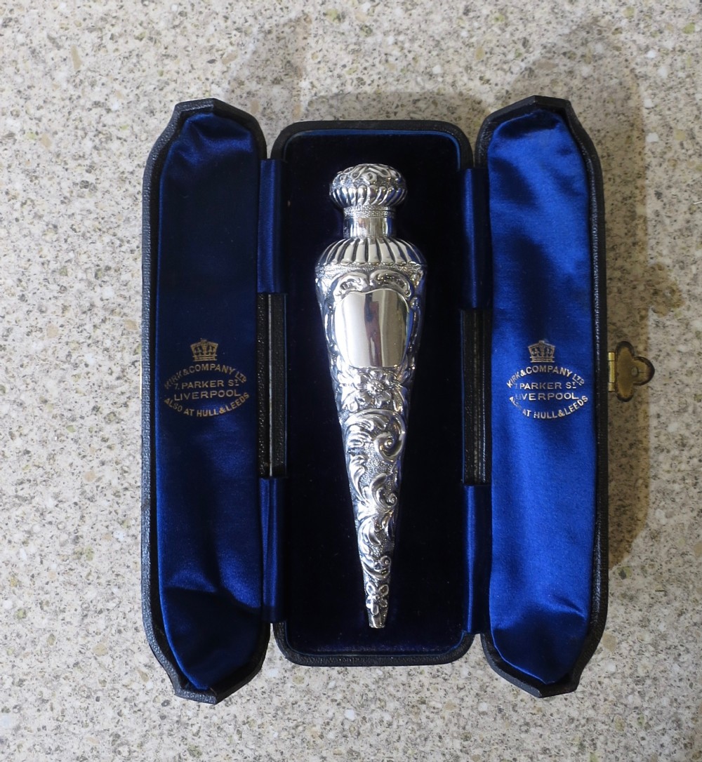 LEATHER-CASED SILVER SCENT BOTTLE