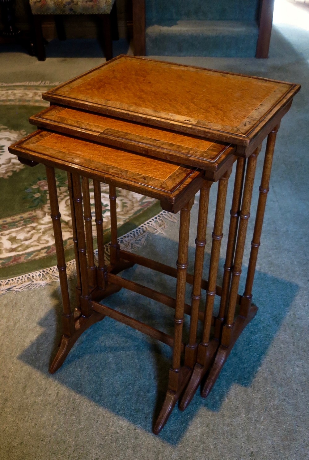 NEST OF 3 EDWARDIAN AMBOYNA-WOOD TABLES