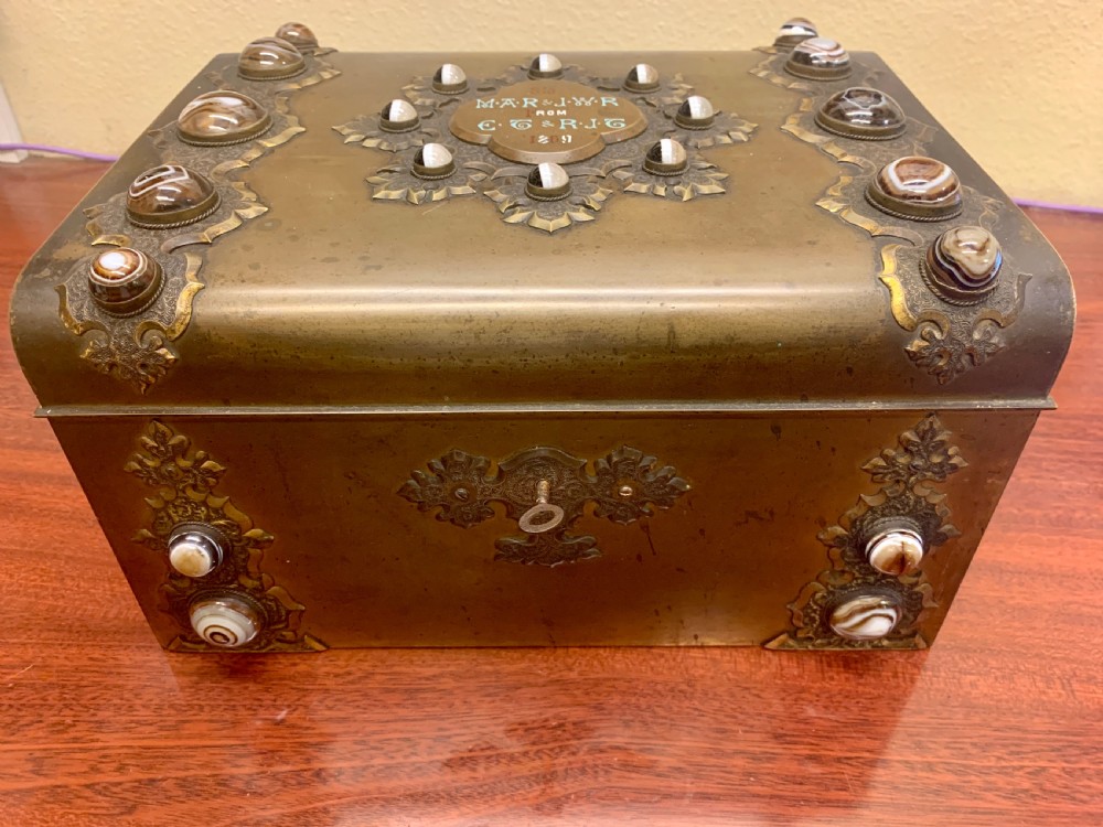 A Fine Quality Brass and Tiger Eye Games Compendium