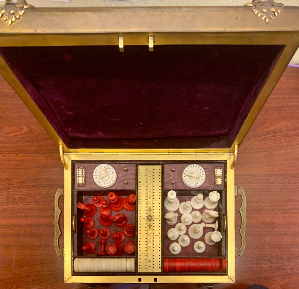 A Fine Quality Brass and Tiger Eye Games Compendium View II