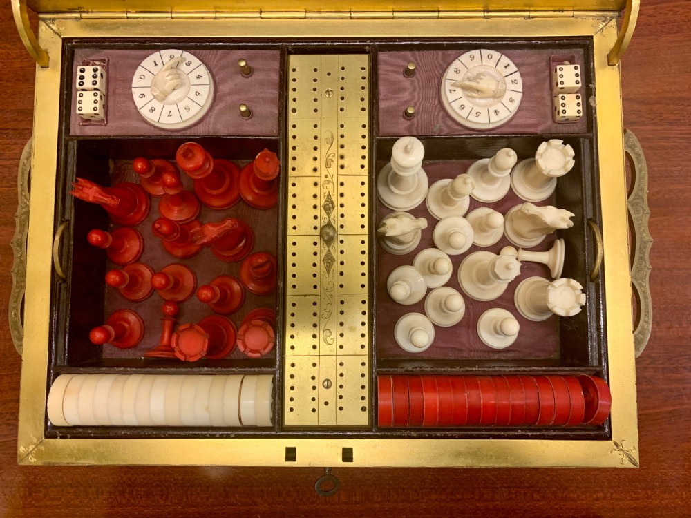 A Fine Quality Brass and Tiger Eye Games Compendium View III
