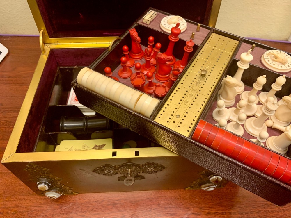 A Fine Quality Brass and Tiger Eye Games Compendium View VIII