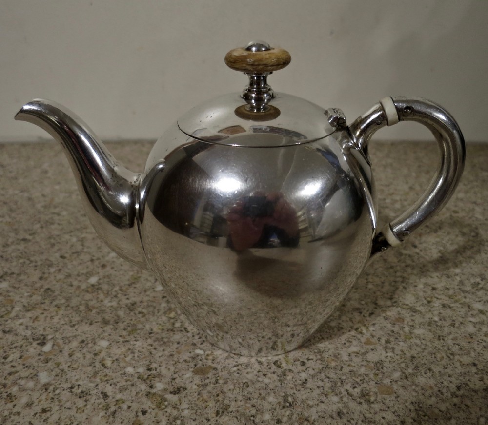 A RARE RUSSIAN SOLID SILVER TEAPOT