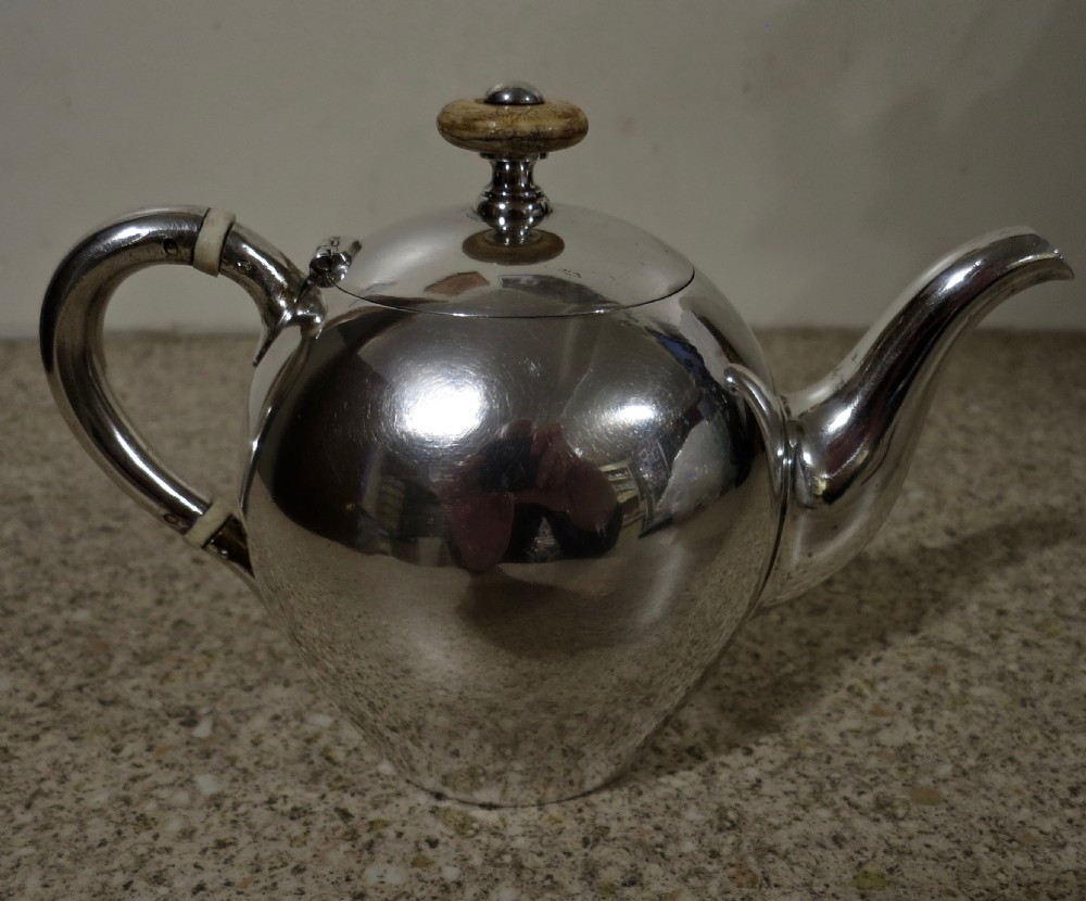 A RARE RUSSIAN SOLID SILVER TEAPOT View II