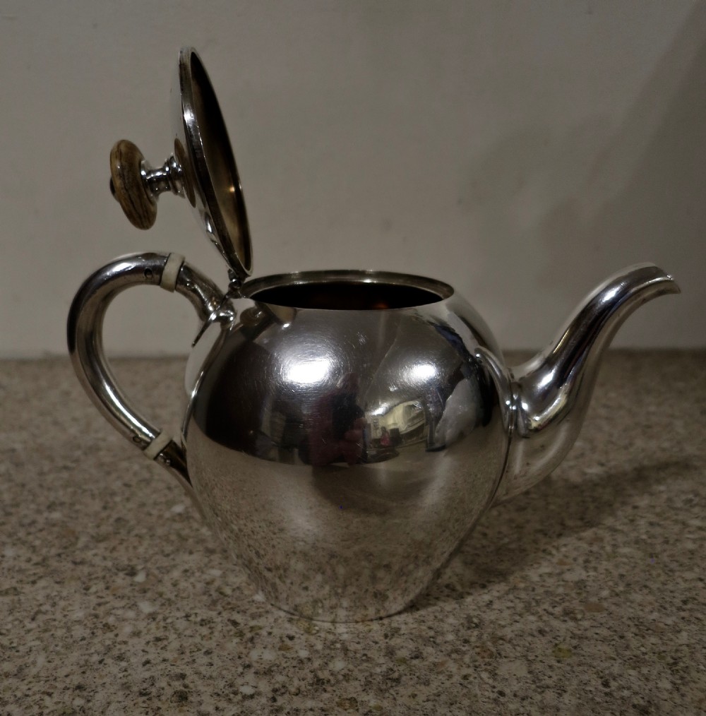 A RARE RUSSIAN SOLID SILVER TEAPOT View III