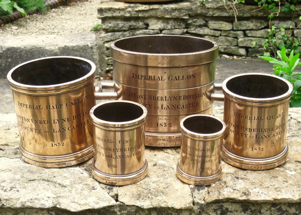 SET OF FIVE BRONZE MEASURES DATED 1852