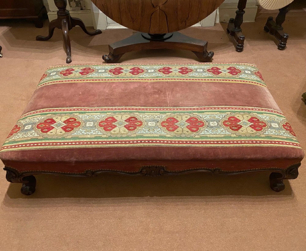 A good and large-sized Victorian embroidered Mahogany footstool