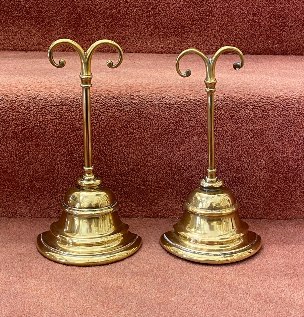 Near PAIR of weighted brass Door Stops