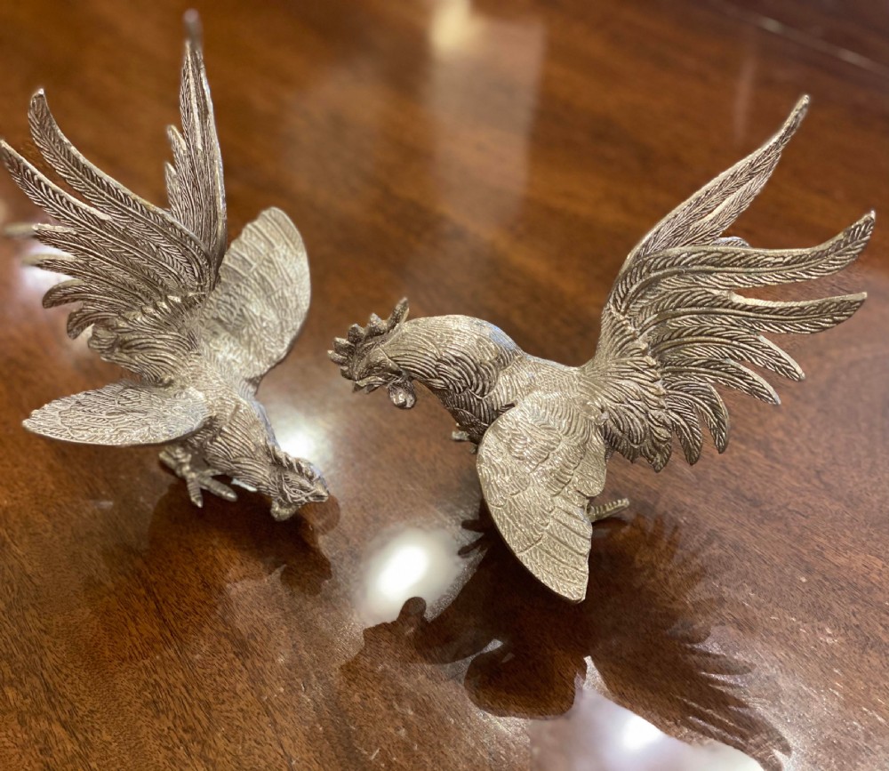 An imposing PAIR of Silver Plated Jousting Cockerels