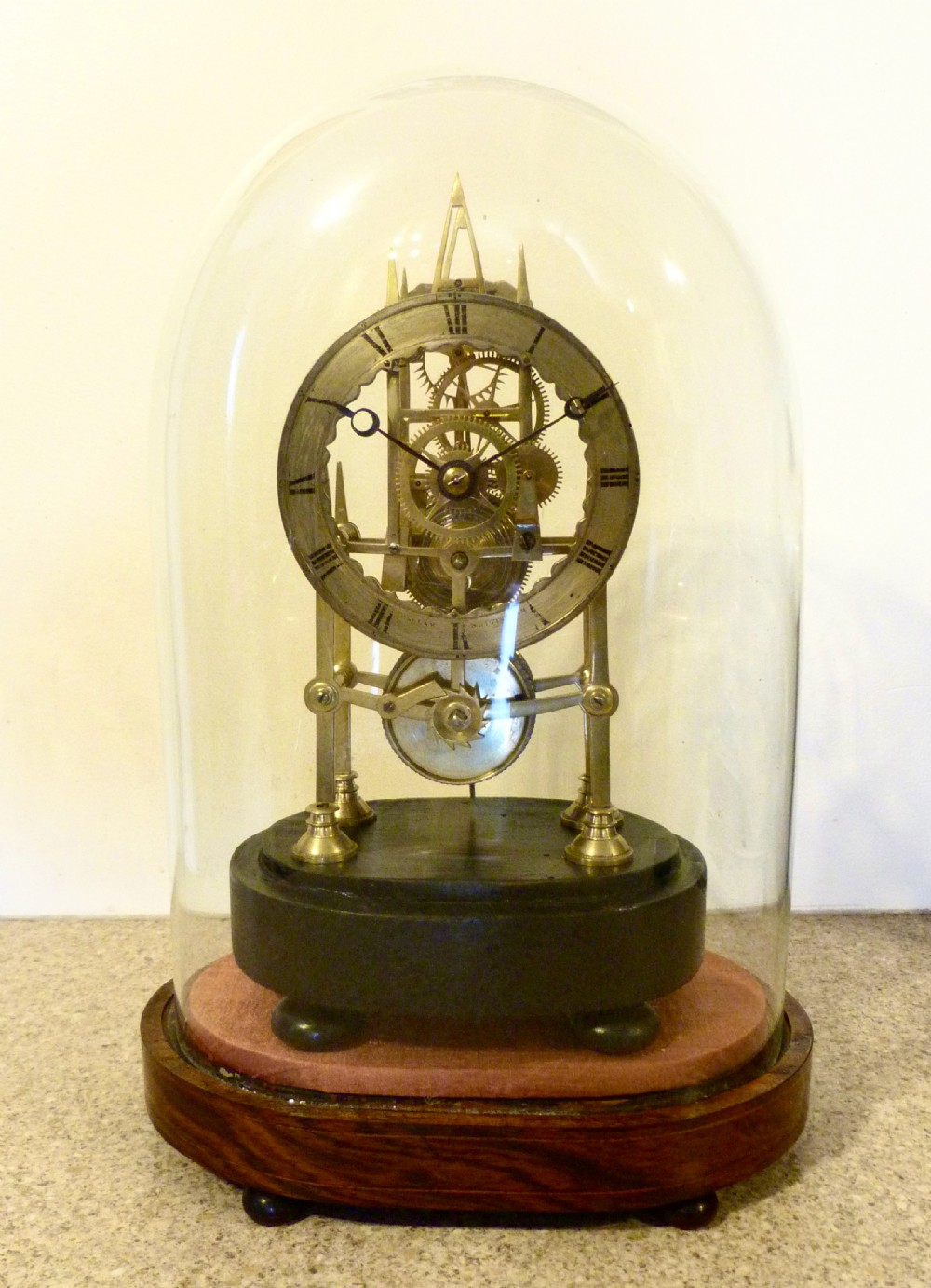 A SMALL ENGLISH SKELETON CLOCK