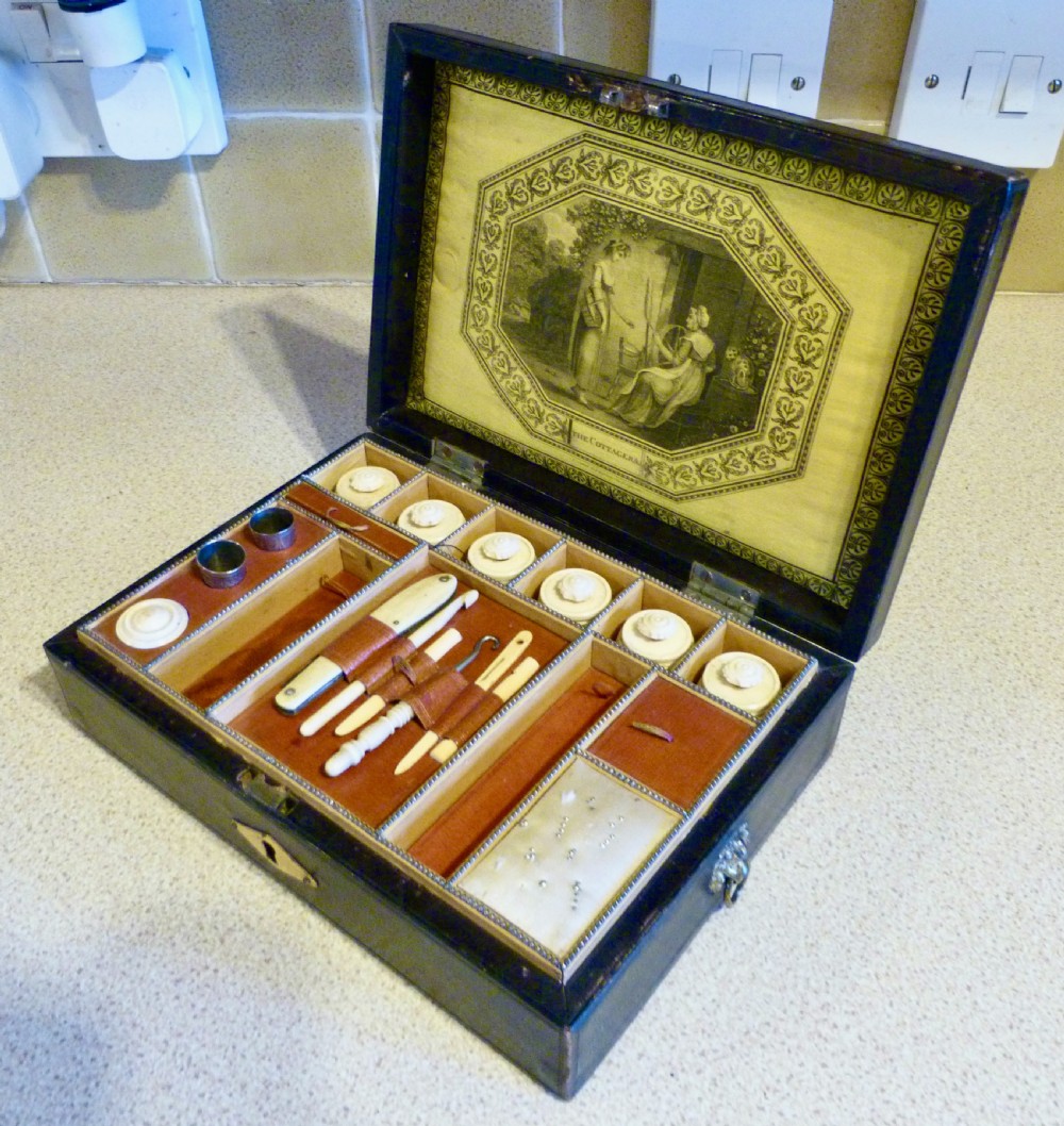 A CHARMING ENGLISH REGENCY SEWING BOX