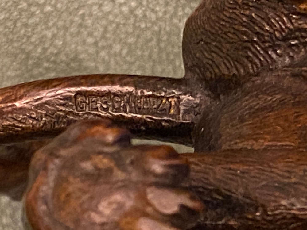 Late 19th century Austrian bronze (Geschutz) model of a crouching lion (5 inches long) View VI