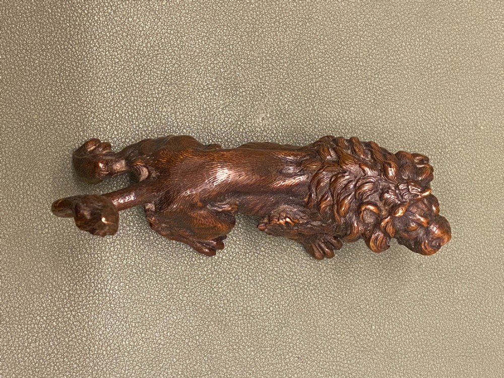 Late 19th century Austrian bronze (Geschutz) model of a crouching lion (5 inches long) View IX