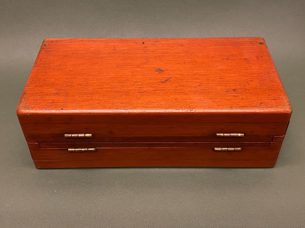 Good 19th century folding mahogany-cased travel chess set View II