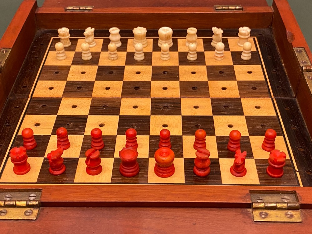 Good 19th century folding mahogany-cased travel chess set View VII
