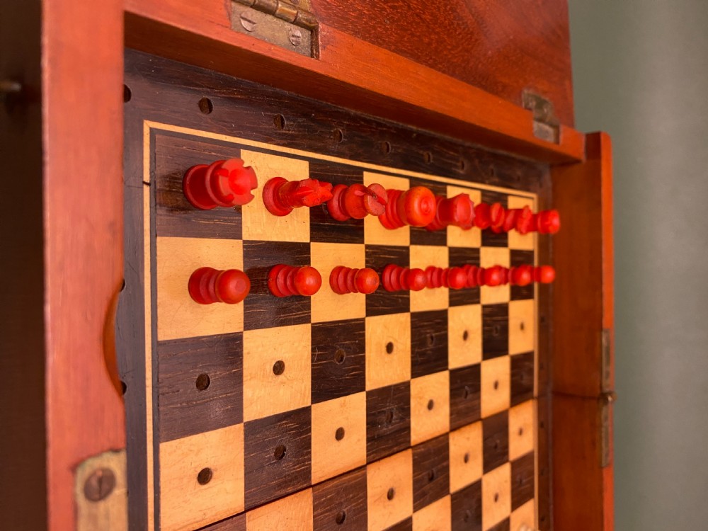 Good 19th century folding mahogany-cased travel chess set View X