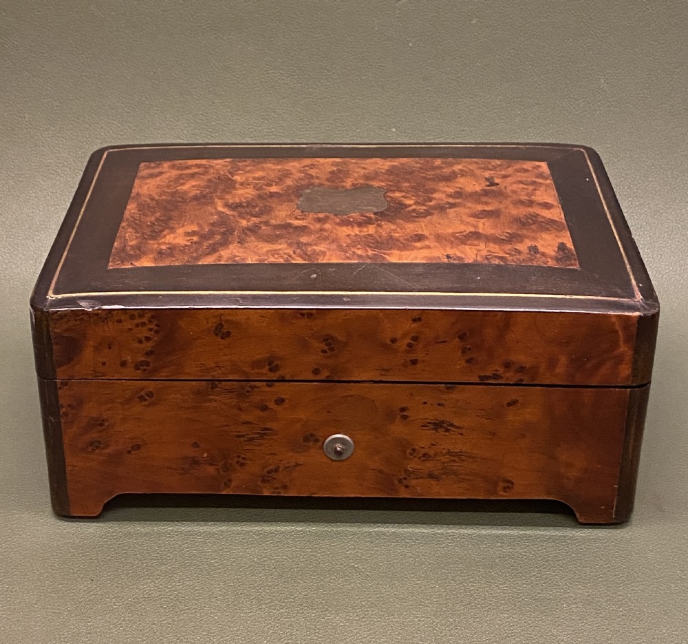 19th century Burr Yew-wood cased music box, of small size, playing 6 beautiful Airs View II