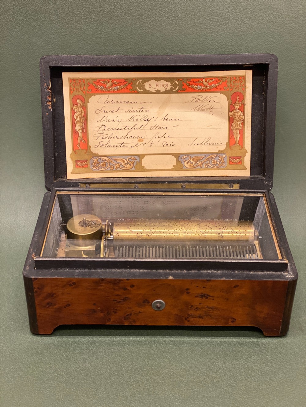19th century Burr Yew-wood cased music box, of small size, playing 6 beautiful Airs View III