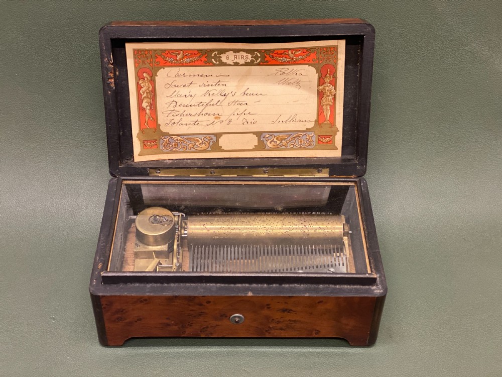 19th century Burr Yew-wood cased music box, of small size, playing 6 beautiful Airs View IV