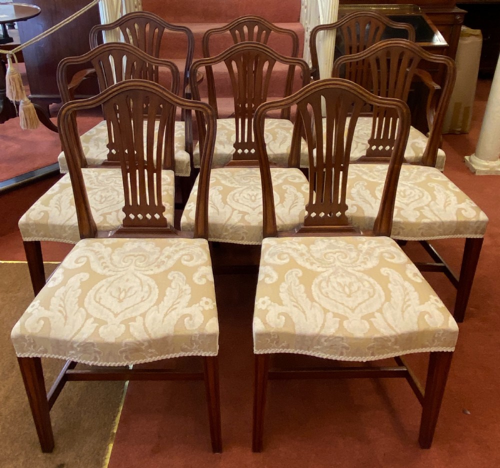 A 19th century set of EIGHT dining chairs, including 2 carvers