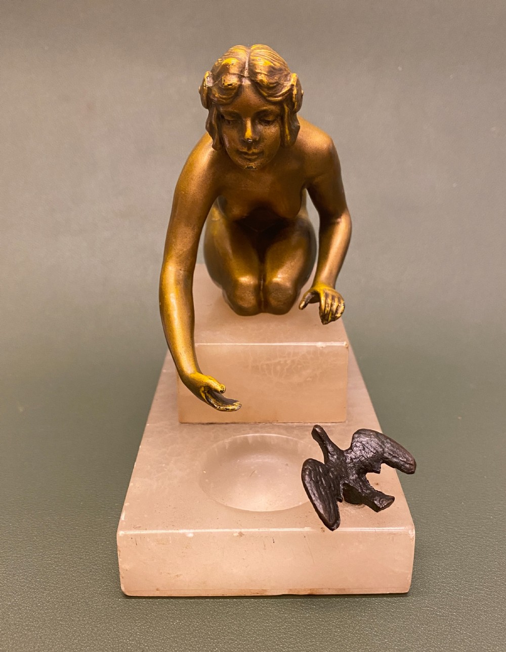 Bronze figure of a young naked woman kneeling, c1910-25 View II