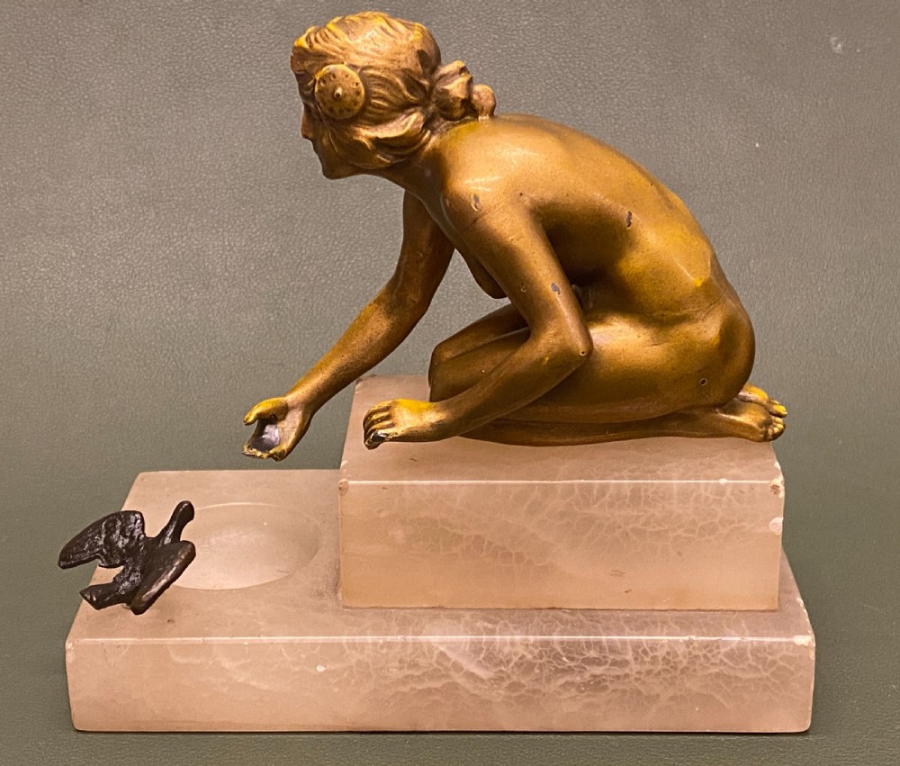 Bronze figure of a young naked woman kneeling, c1910-25 View III