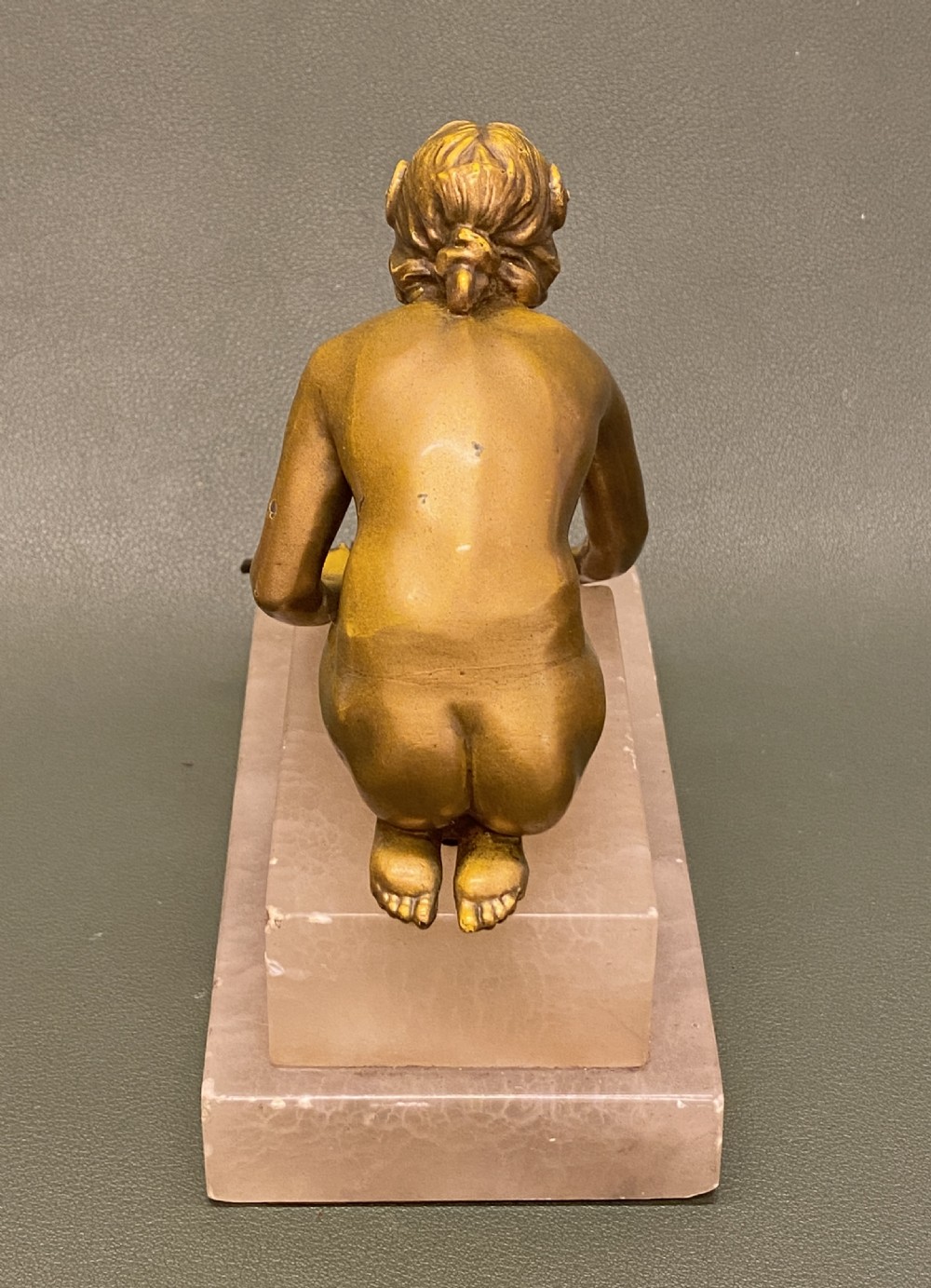 Bronze figure of a young naked woman kneeling, c1910-25 View V