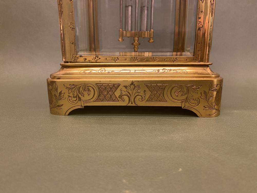 A good French engraved brass 4-glass Mantel Clock with mercury weighted pendulum View V