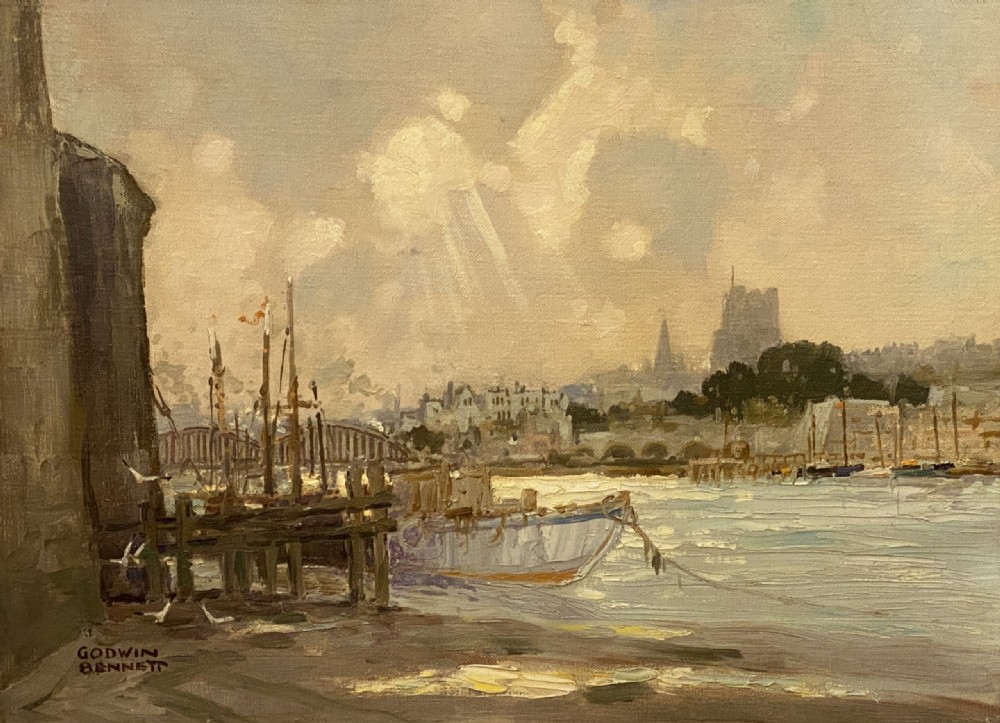 A framed oil painting depicting a river harbour scene in Rochester with boats moored beside a wooden pier under a light sky. View II