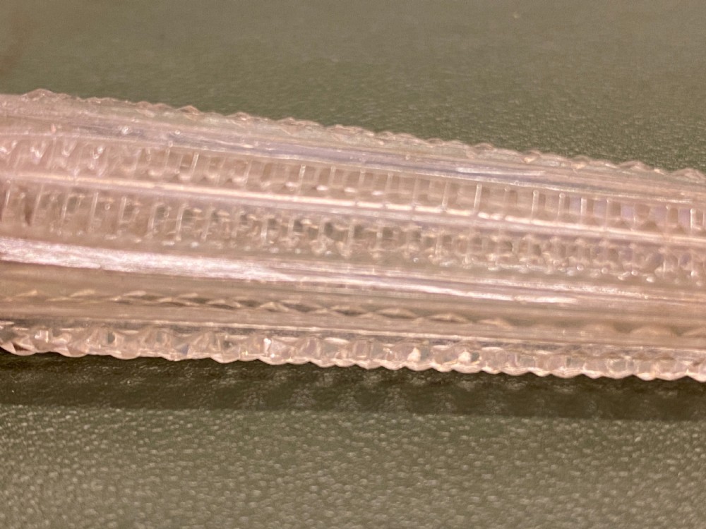 Tapering Clear Cut-Glass Scent Bottle with silver top. View V