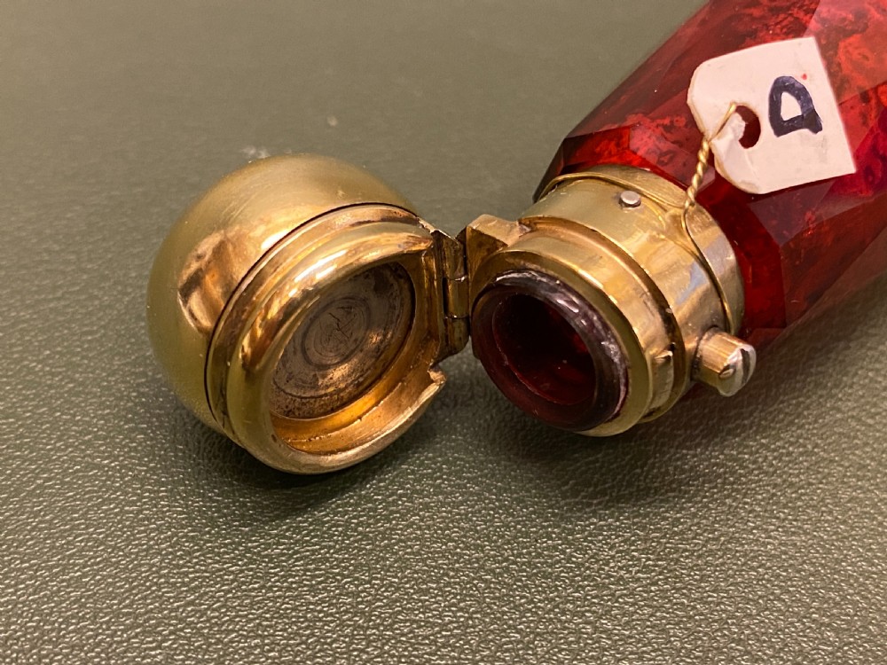 A Ruby-Glass multi-facted DOUBLE-ENDED Sent Bottle with Gilt Metal ends View III
