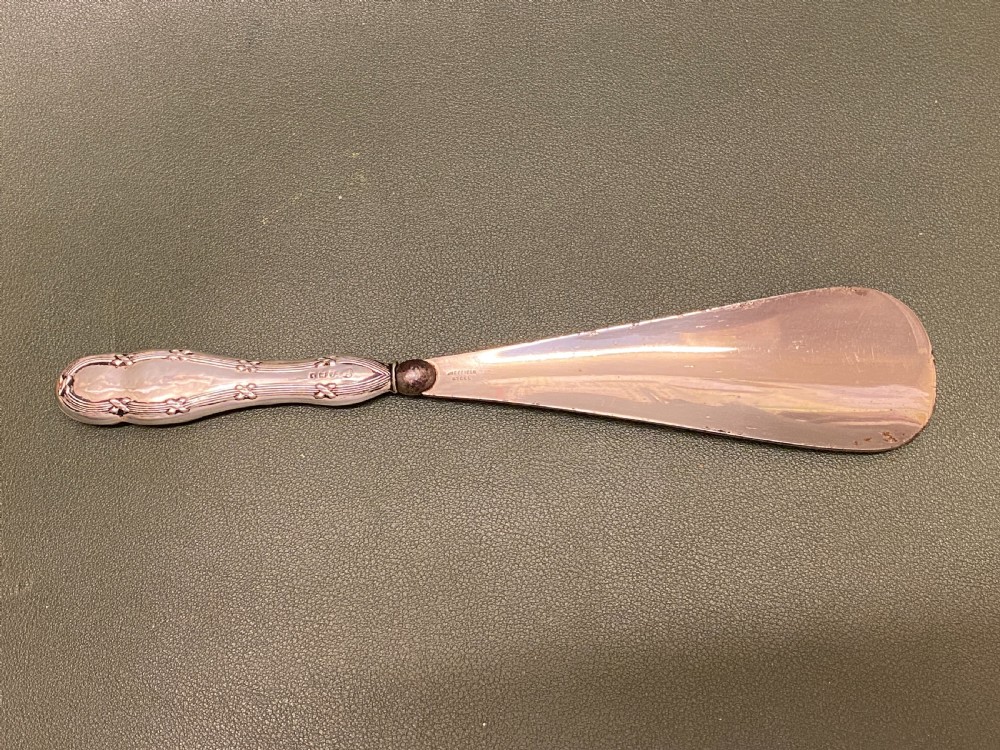 A hallmarked silver handled SHOE HORN - Birmingham 1909