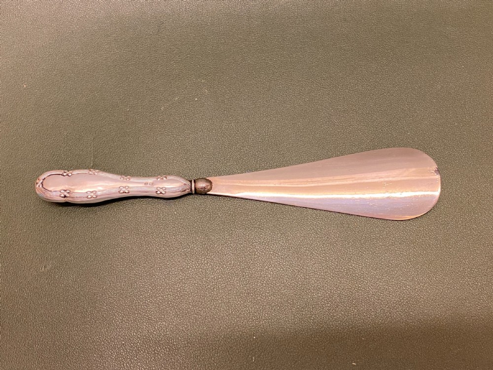 A hallmarked silver handled SHOE HORN - Birmingham 1909 View V