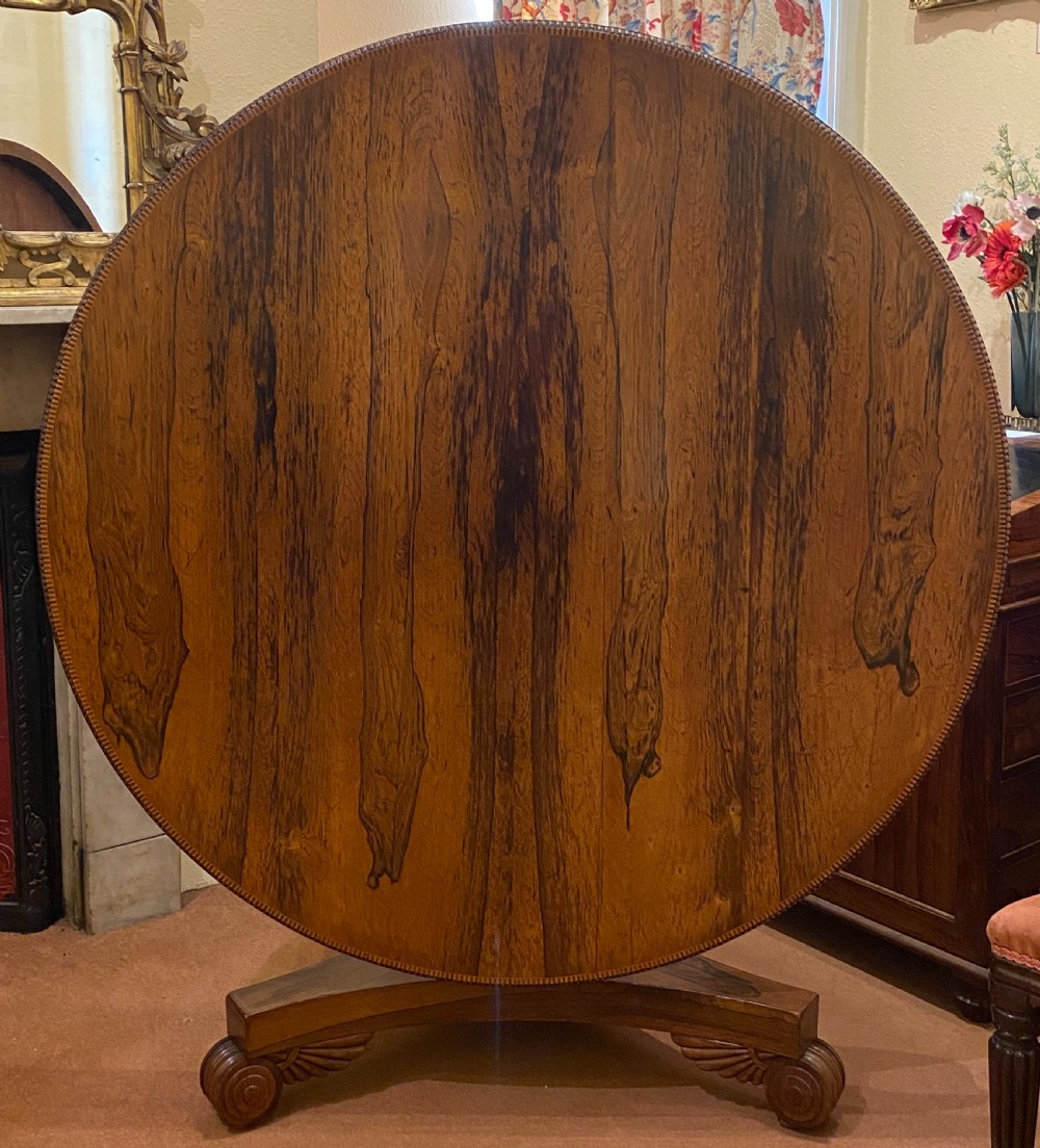 Regency period circular rosewood tilt-top breakfast/dining/centre table - Seats 6