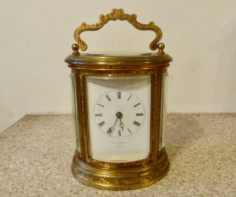 A SUPERB STRIKING OVAL CARRIAGE CLOCK View III