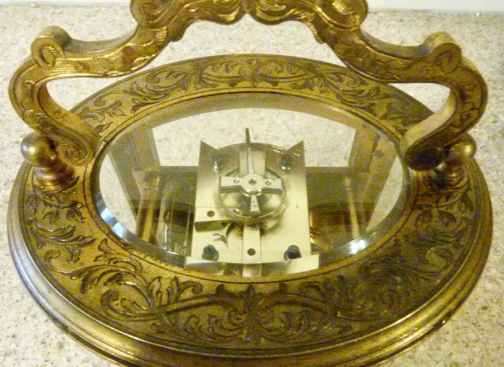 A SUPERB STRIKING OVAL CARRIAGE CLOCK View IV
