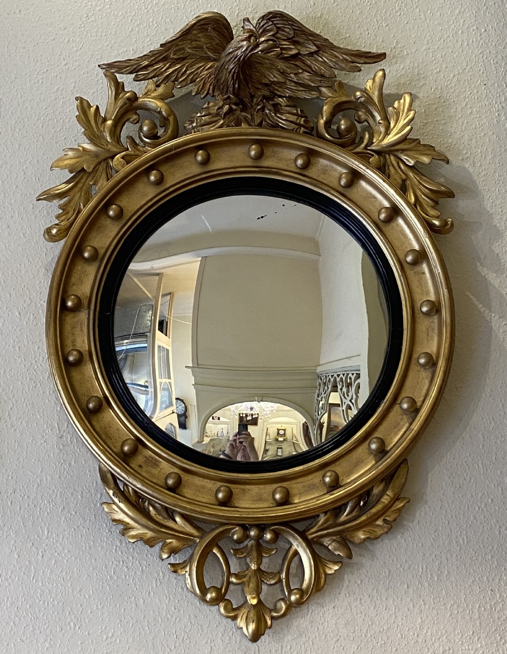 Regency style giltwood framed circular convex wall mirror View III