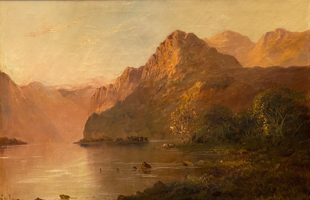 A Victorian oil painting on canvas by Gustave De Breanski depicting a mountainous lake view at sunrise in an ornate gilt frame. View III