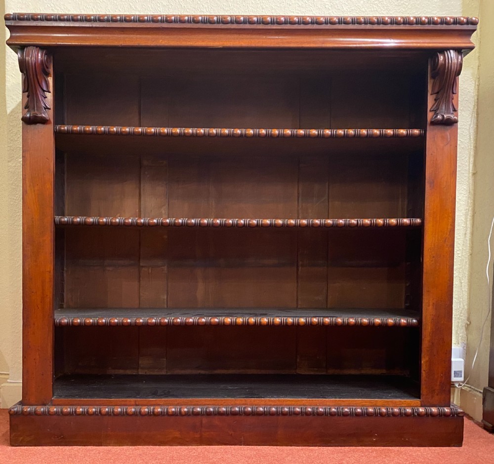 A good mid-19th century mahogany open-fronted dwarf bookcase