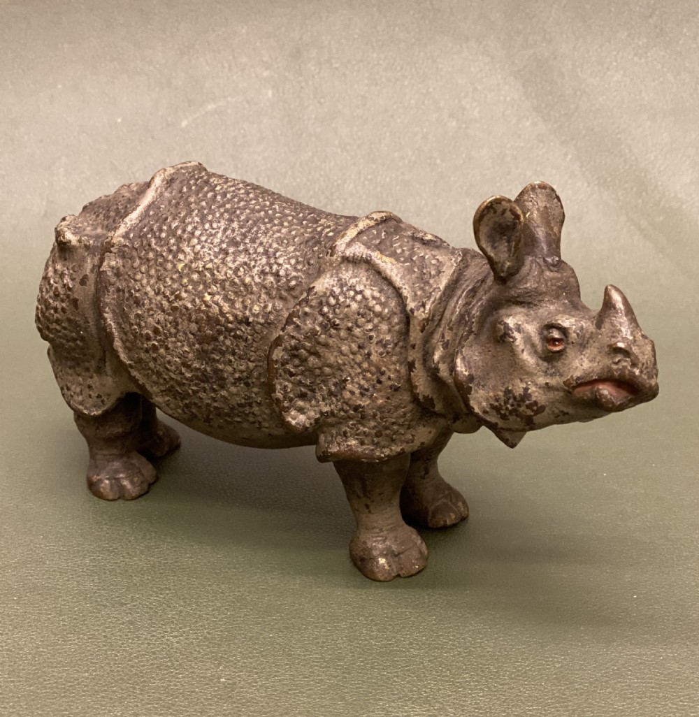 A rare late 19th century Austrian cold-painted bronze model of a Rhinoceros (15cm long)