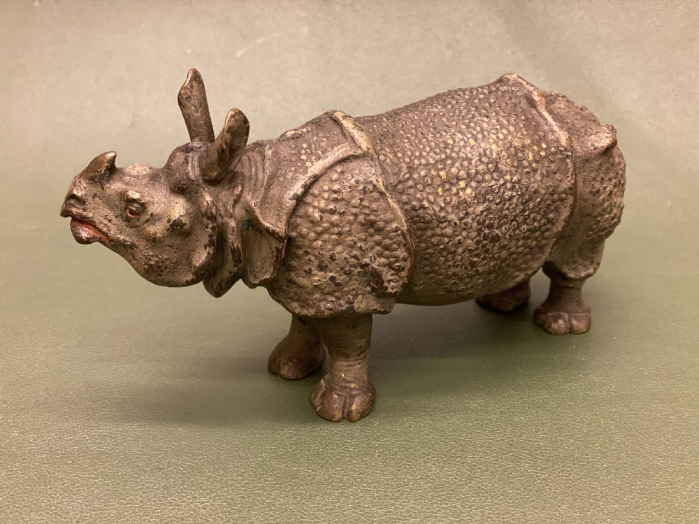 A rare late 19th century Austrian cold-painted bronze model of a Rhinoceros (15cm long) View III