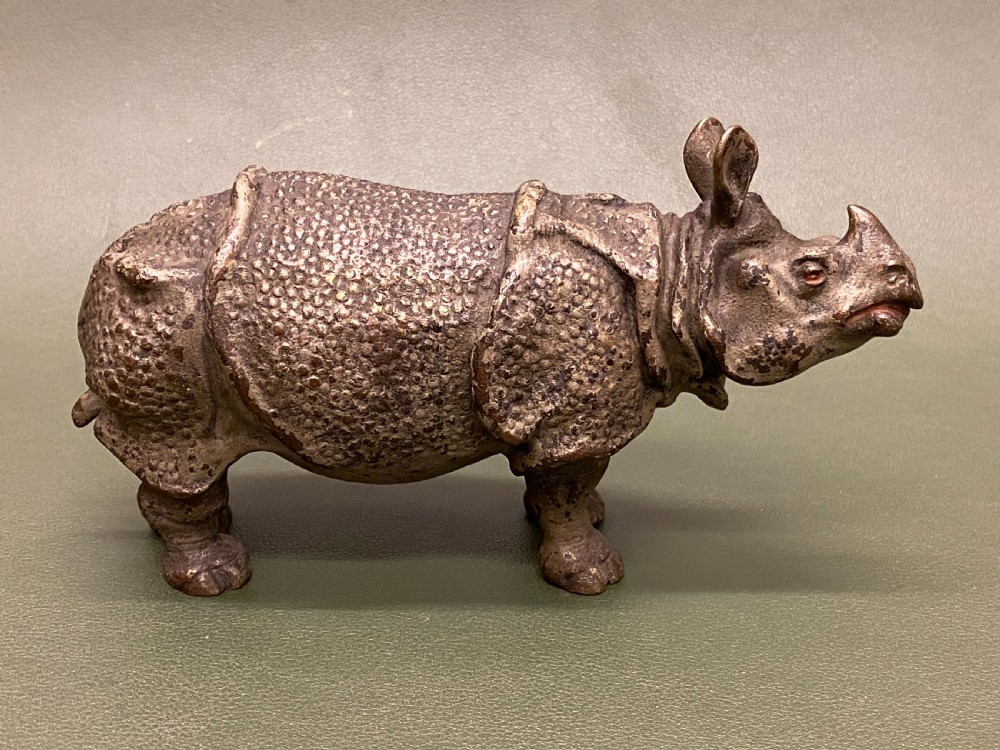 A rare late 19th century Austrian cold-painted bronze model of a Rhinoceros (15cm long) View V