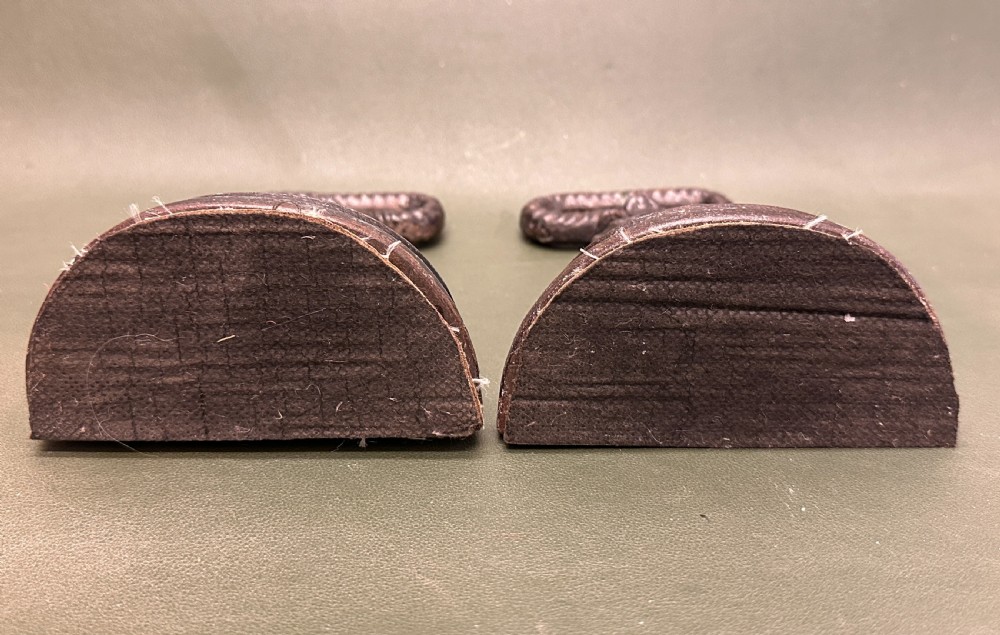 A PAIR of 19th century Kenrick cast-iron weighted Doorstops View V
