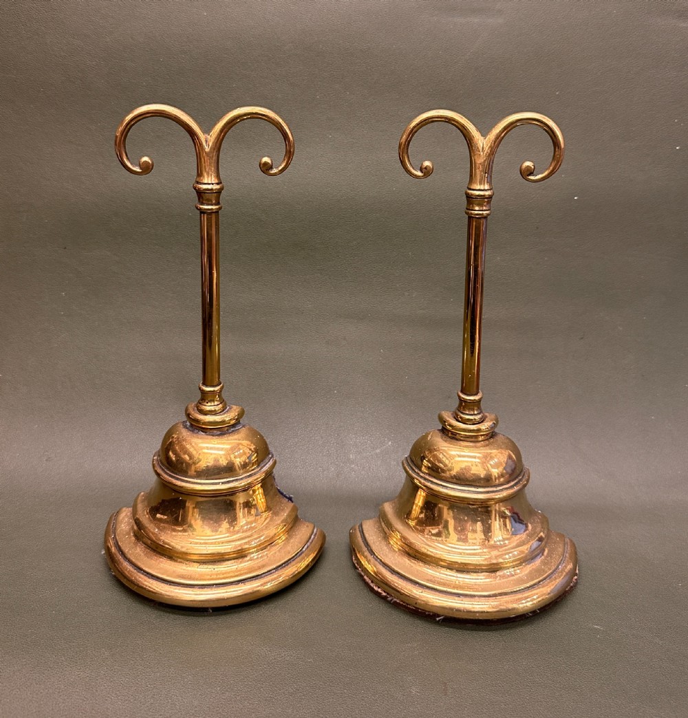 A PAIR of William TONKS weighted brass 'jester-hat' Doorstops