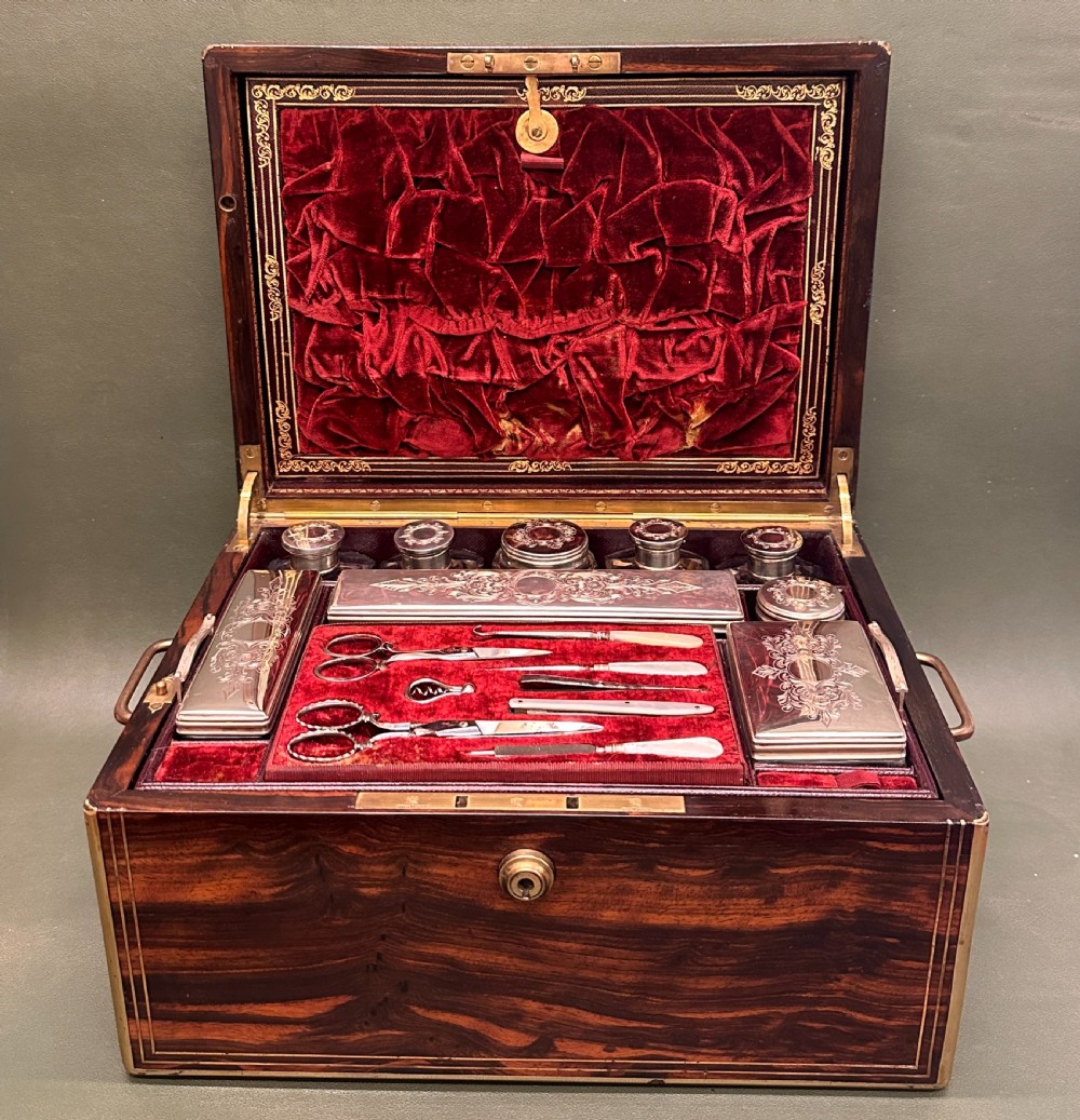 A good coromandel-wood Lady's silver Dressing Case and contents, Hallmarked 1858
