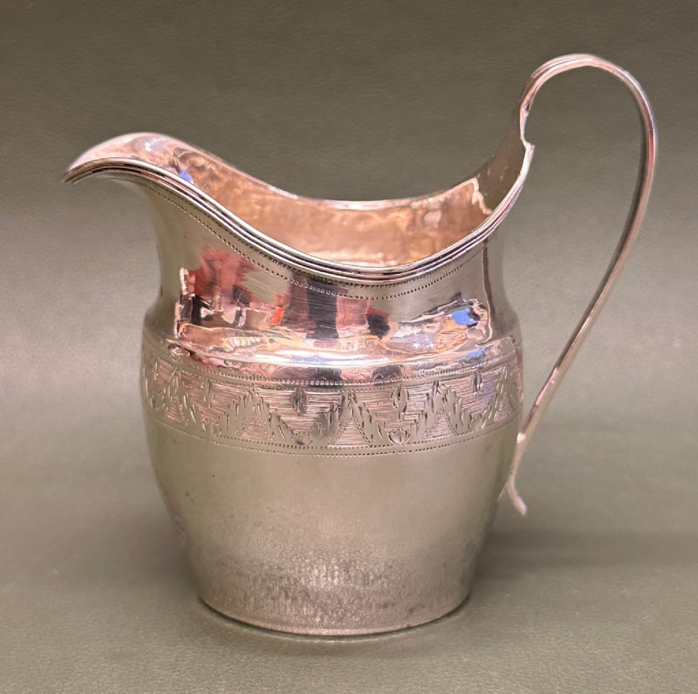 Engraved and hallmarked English Silver Cream Jug. London c.1822