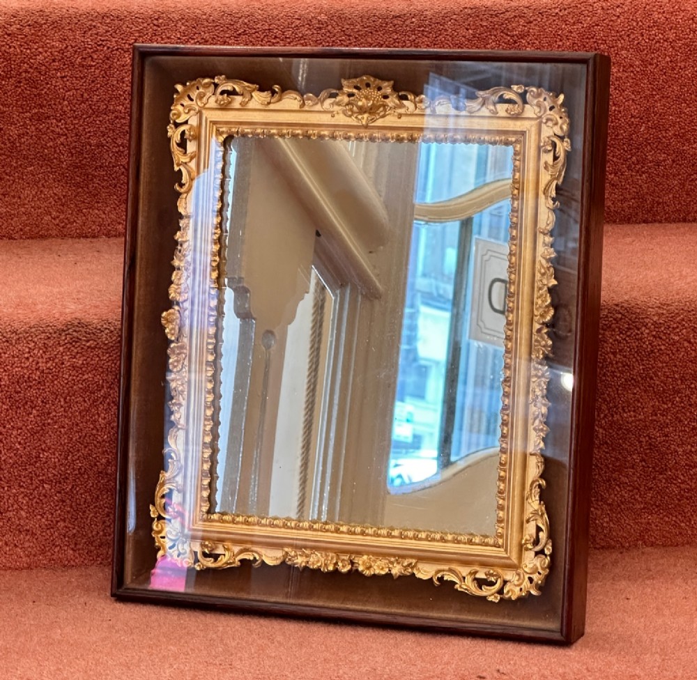 A very good Victorian ornate gilt framed mirror (61cm x 30.5cm)
