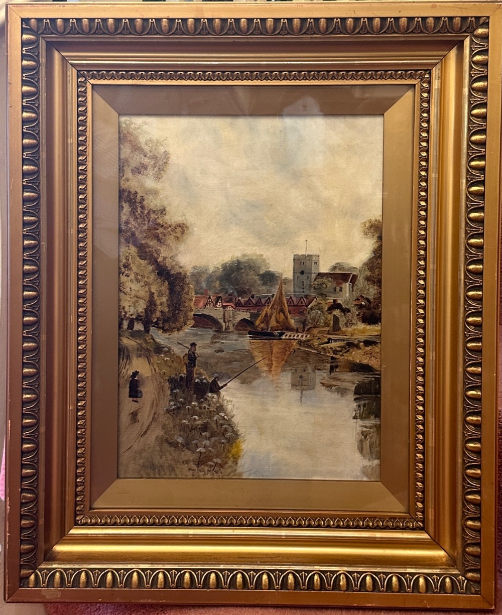 A late 19th-century Victorian oil painting depicting a river landscape with figures fishing along the bank, set within an ornate gilt wooden frame.